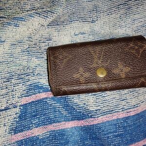 Louis Vuitton Brown Monogram Wallet with Gold Accent